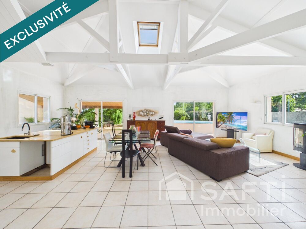 Vente Maison Maison de plain pied de 155 m2, 4 chambres, avec piscine, grand terrain et environnement calme Le taillan-medoc