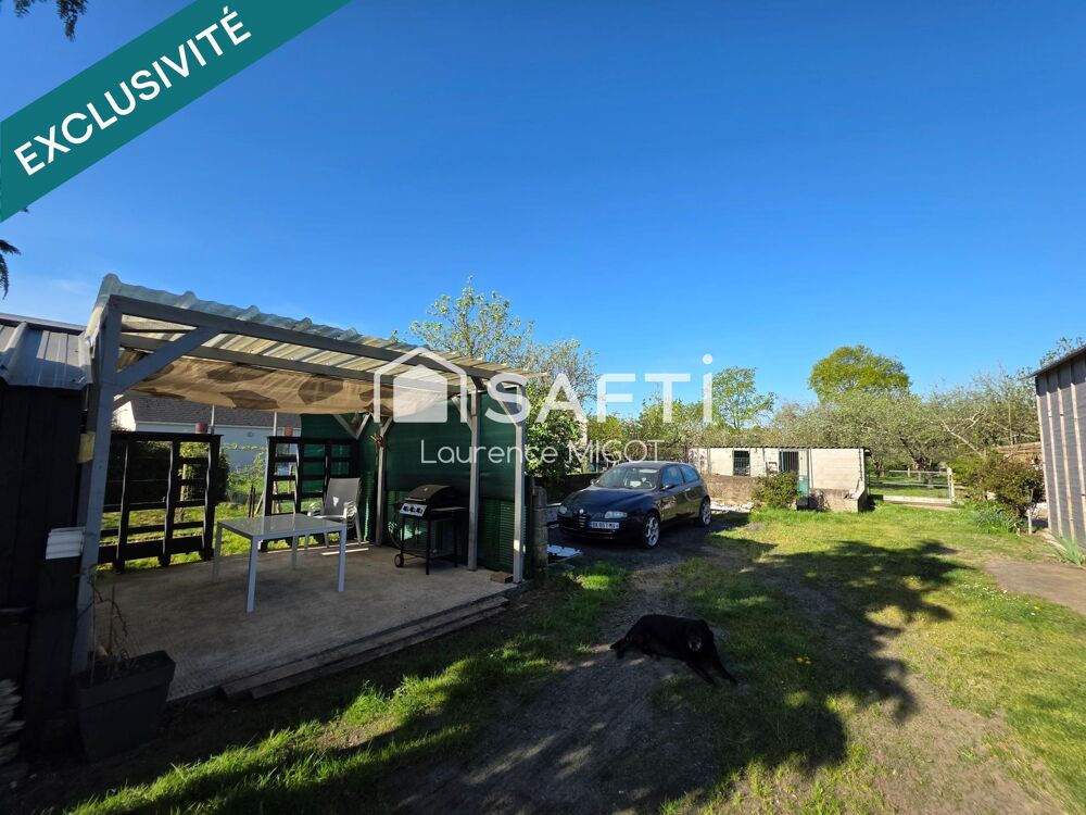 Beau terrain constructible avec dépendances