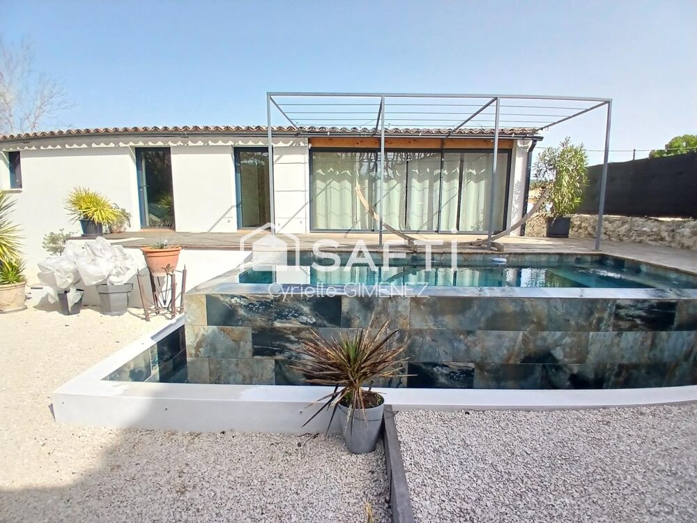 Maison moderne de 147 m2 de plain pieds, avec piscine à débordement sur Malemort-du-comtat