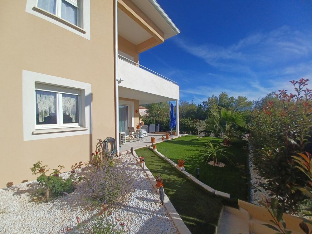 Appartement de 64m2 - 2 chambres- jardin -parking