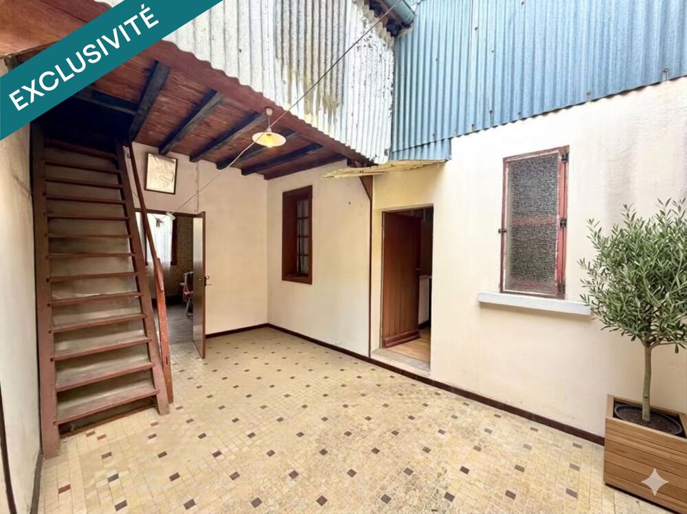 MAISON DE VILLE AVEC GRAND GARAGE ET TERRASE INTERIEURE