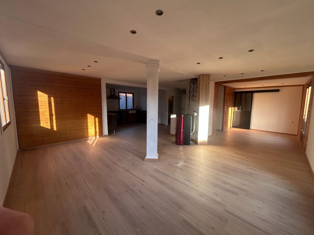 Maison individuelle chaleureuse et atypique