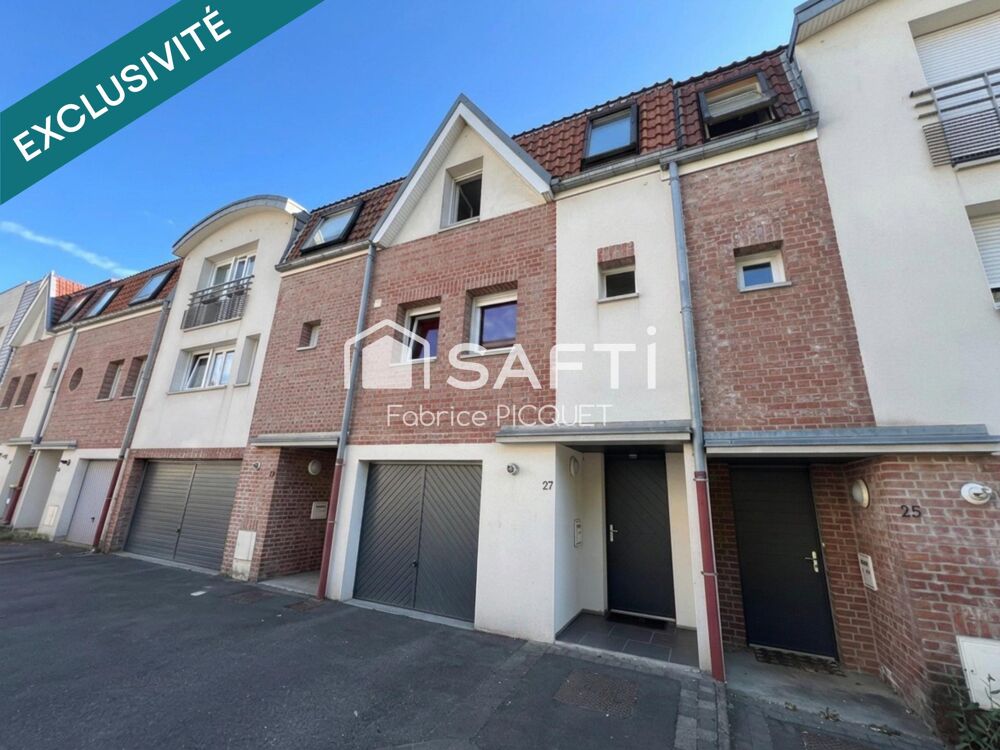 Maison de ville avec trois chambres, garage et jardin
