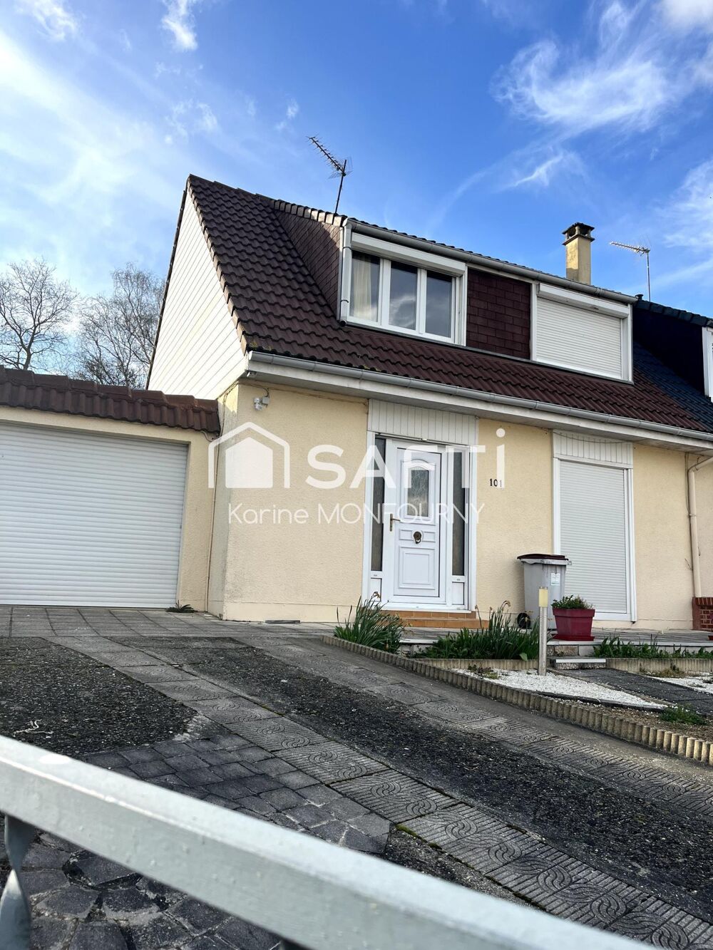 Maison semi-mitoyenne quartier Hôpital avec jardin, garage et cave