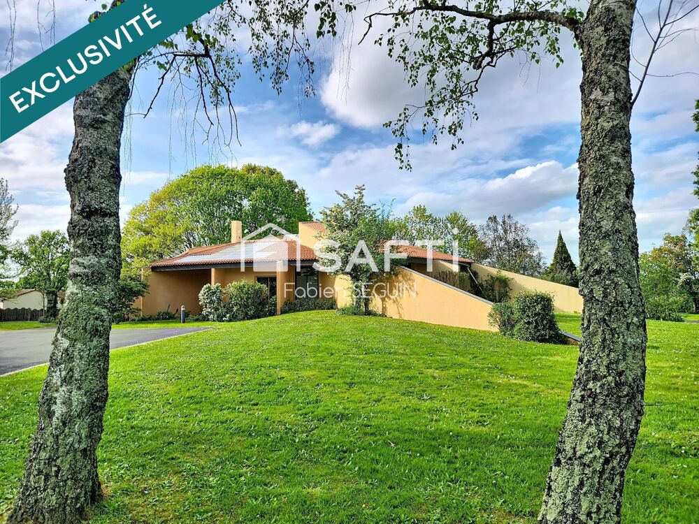 Vente Maison Maison d'architecte de 228 m2 édifiée sur une propriété arborée de 5384 m2 constructible au PLUI Sevremoine