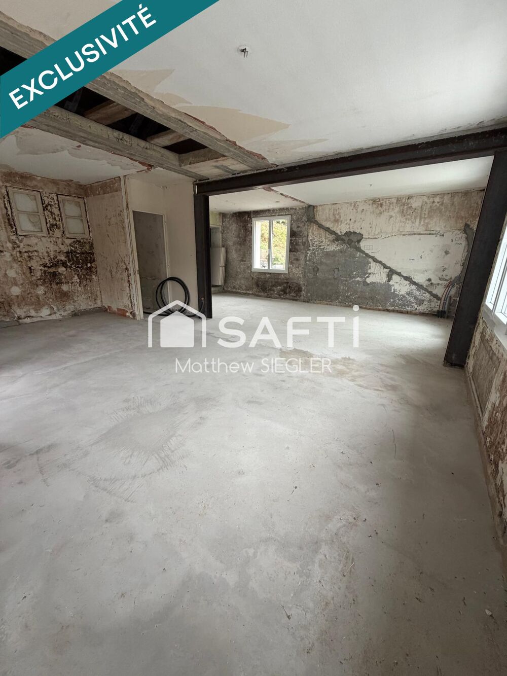 Maison de 80 m² avec 2 chambres, dépendance, atelier et 2 garages, dont un de 40 m² : un bien plein de potentiel pour réaliser v