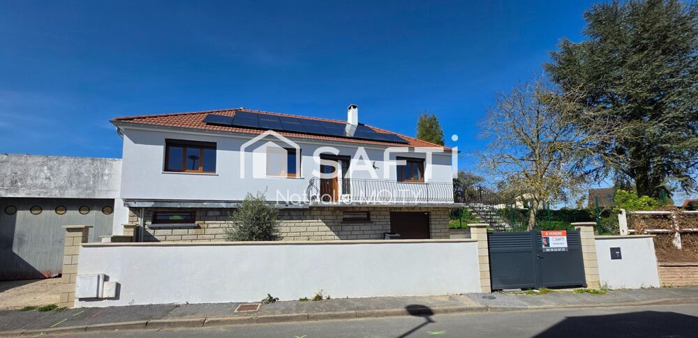 Pavillon habitable de PLAIN PIED élevé sur sous sol avec garage et dépendance T2, DPE C.