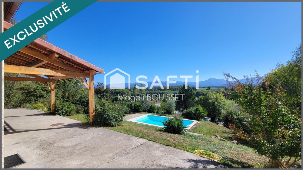 Charmante Maison T6 de 179m², 5 chambres dont une suite parentale, piscine, terrasses, garages, jardin de 3446m². Finitions à pr