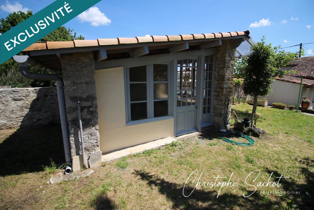Maison 4 chambres prête à vivre , 2 garages et dépendances !
