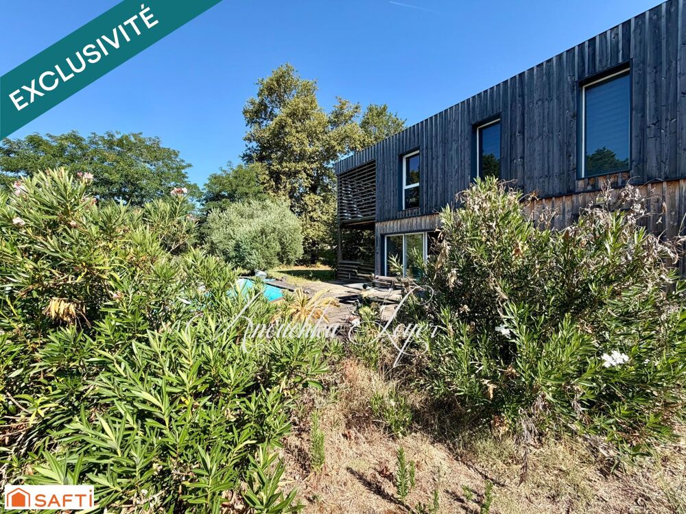 Maison avec terrain, carport, piscine et garage