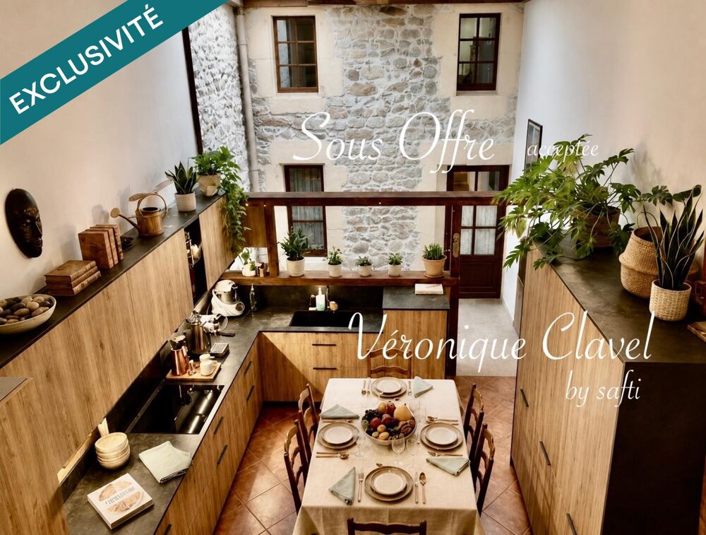 Maison de village en pierre apparentes de 110m2 récemment rénovée avec patio et Garage de 40m2