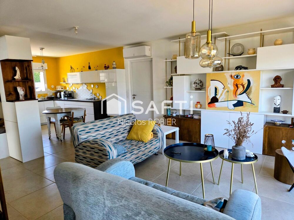 PLAIN PIED IMPECCABLE , DEUX CHAMBRES , GARAGE, JARDIN ET PLUS !