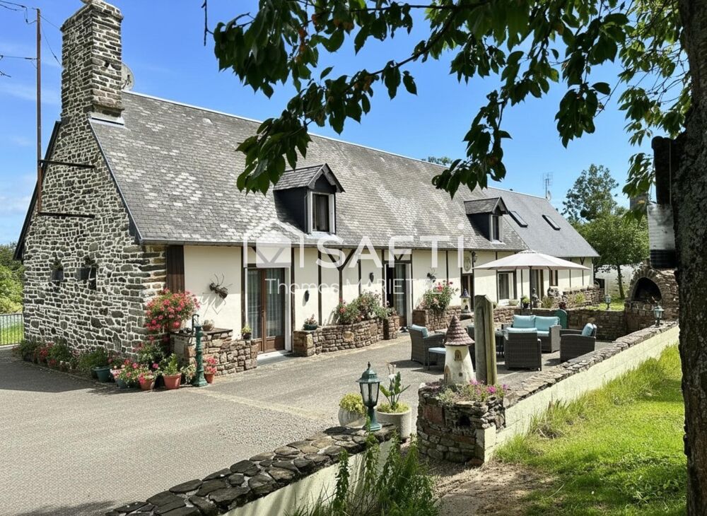 Maison, style Longère en pierre, avec terrain tout autour et une dépendance idéale pour gîte