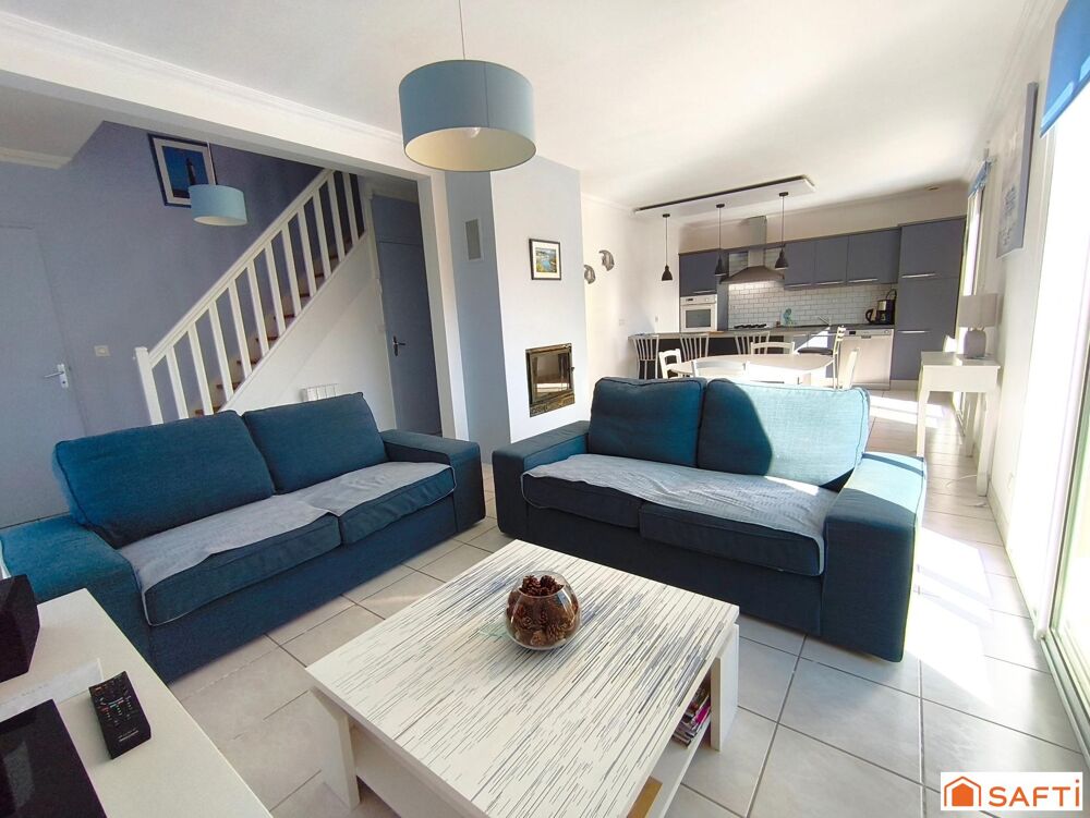 Maison lumineuse avec vie de plain-pied et petite vue mer