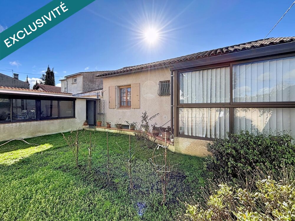 Maison impeccable avec sous-sol, garage et véranda