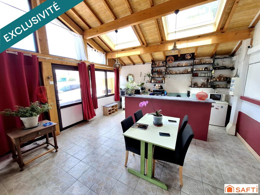 Maison sur 2 niveaux, 5 pièces, 3 chambres, 210m2 et garage