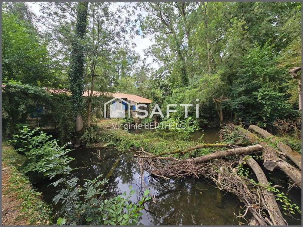 MOULIN A RENOVER AVEC CACHET / BEAU POTENTIEL/ PRESQU'ILE / CADRE VERDOYANT !