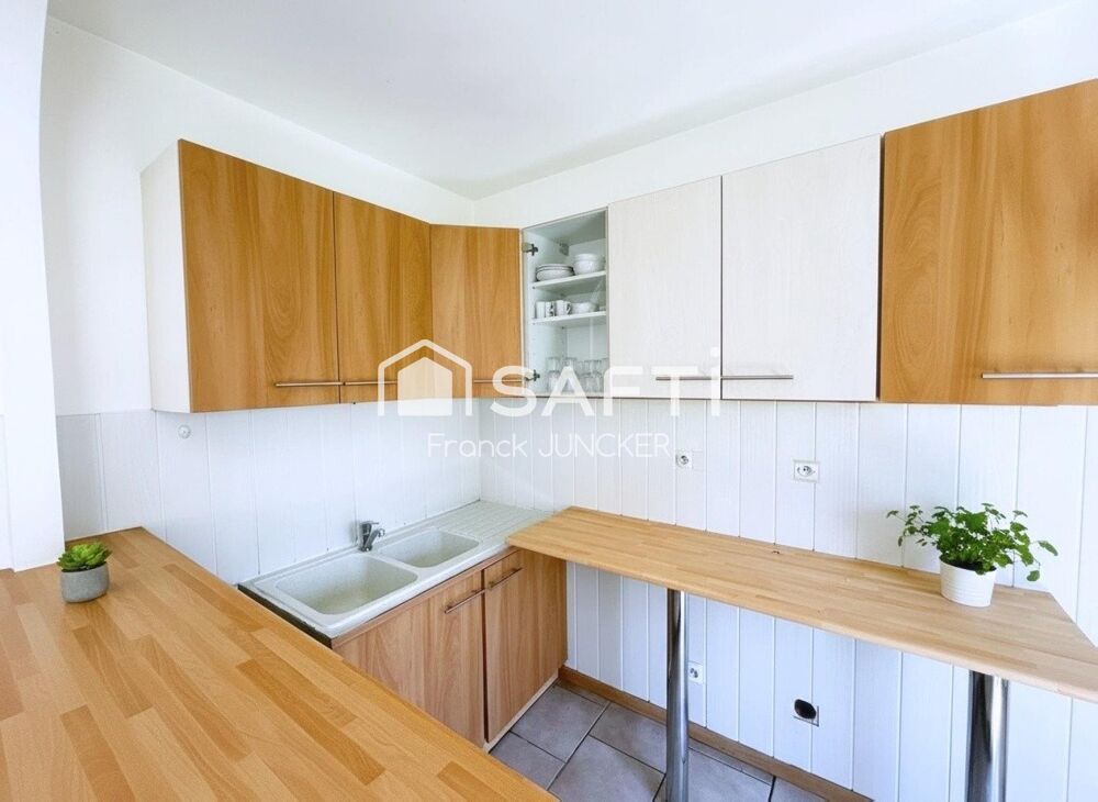 Appartement T2 Rez-de-chaussée avec Cave et Parking .