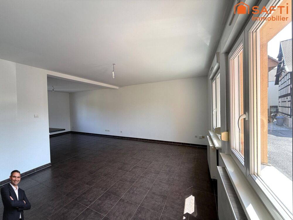 Superbe appartement de 3 pièces au RDC, disposant de 2 places de stationnement privées et 2 caves !