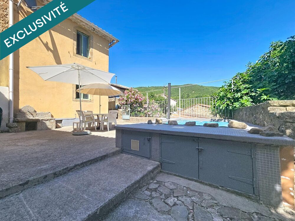 Vente Maison Une maison coup de cœur au charme exceptionnel, avec piscine et vue dégagée au cœur des Hauts Cantons. Camplong