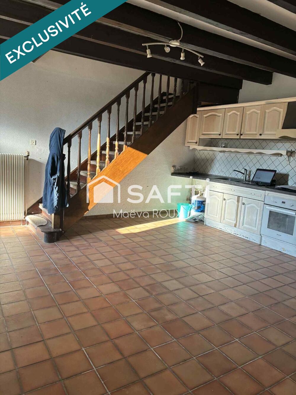 Grande maison familiale avec revenus locatifs