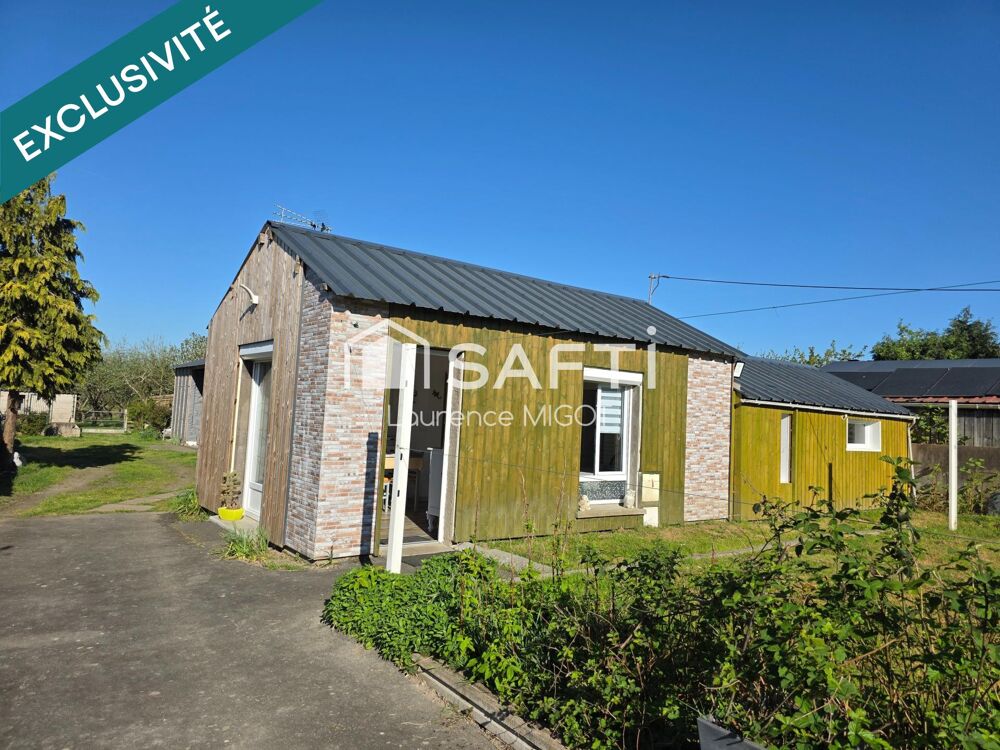 Beau terrain constructible avec dépendances