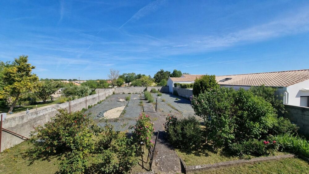 MAISON AVEC POTENTIEL ET GRAND TERRAIN DIVISIBLE