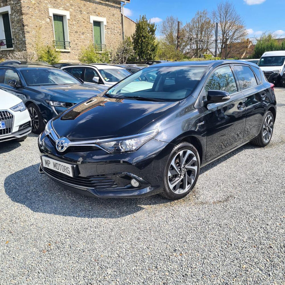 Auris 1.8 HYBRID 136 CVT AUTO DESIGNE BUSINESS 1 MAIN Prix 14990 T 2019 occasion 78690 LES ESSARTS LE ROI