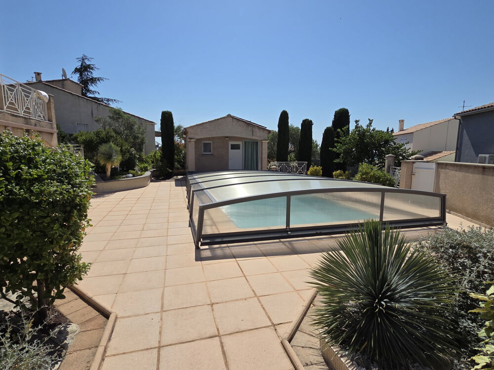 Juvignac Villa 147 m2 4 chambres Piscine couverte Terrain arboré 940 m2