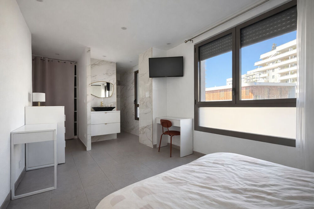 Dépt Hérault (34), à vendre MONTPELLIER Port marianne Appartement t4 de 89m2 terrasse et parking.