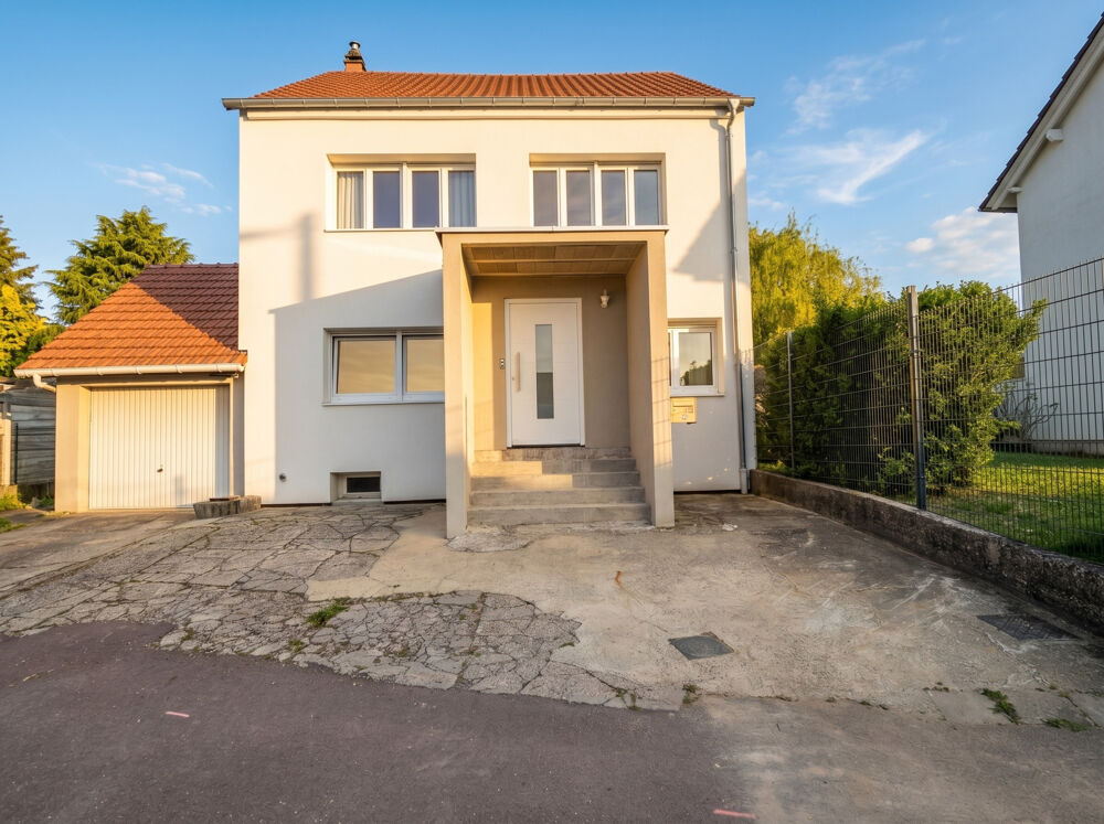 Maison individuelle rénovée avec grand terrain dans un environnement calme