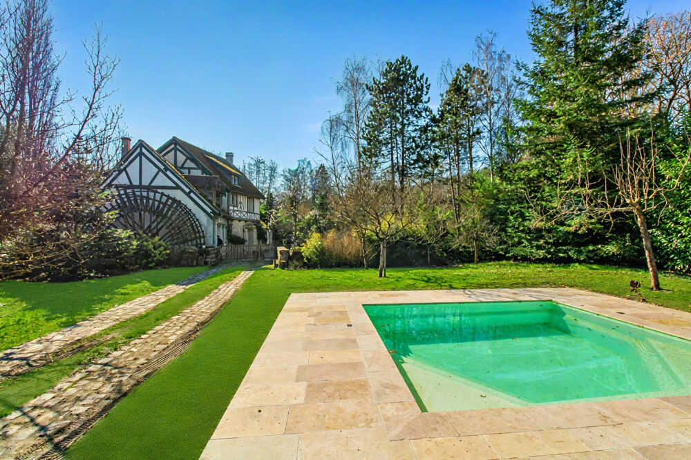 A vendre Dpt Eure (27) proche Pacy sur Eure Moulin 353 m2 avec piscine sur terrain de 5542 m2 au bord de riviè