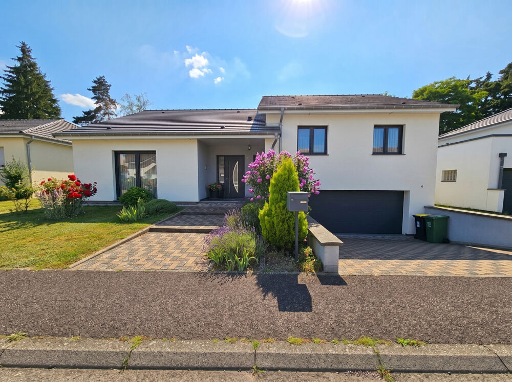 Maison individuelle de 135 m2 avec jardin et garage double dans un quartier recherché de Forbach