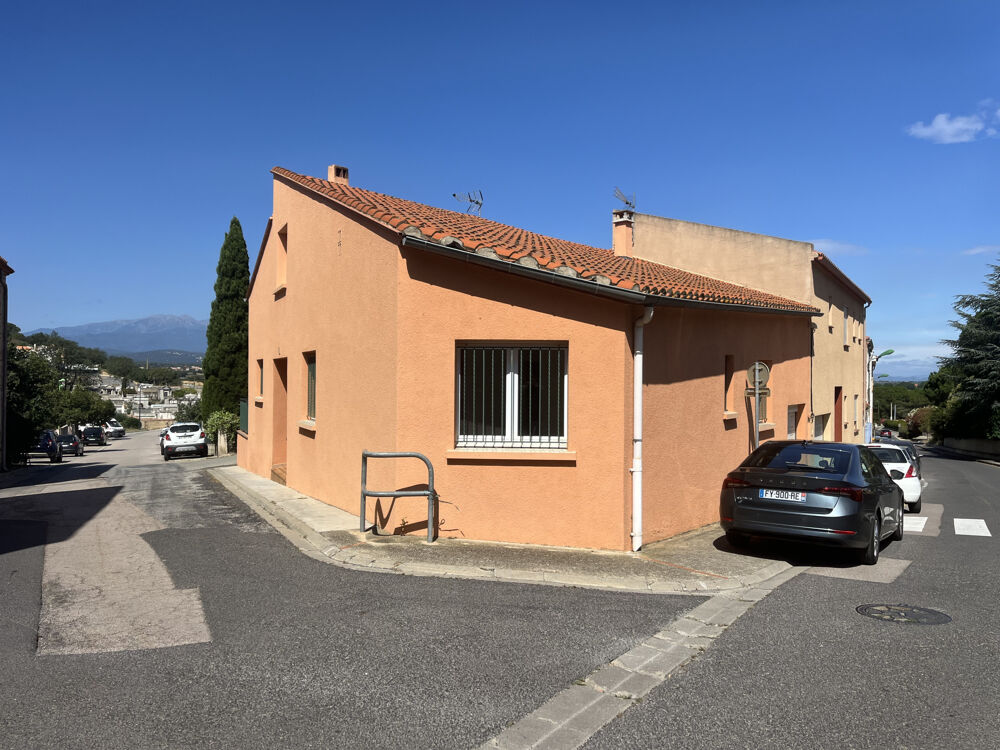 Belle maison de plain-pied au coeur du village comprenant....