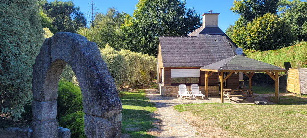 A VENDRE PLOURIVO MAISON AVEC EXTENSION BOIS DANS UN CADRE BOISE
