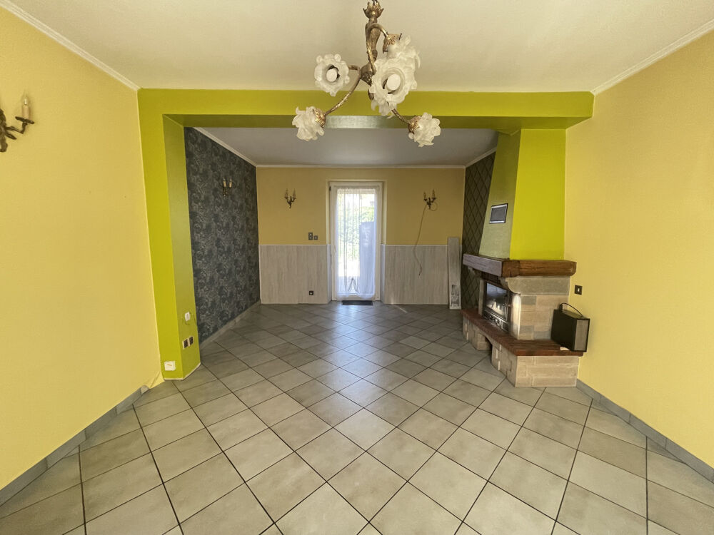 Maison mitoyenne avec terrain