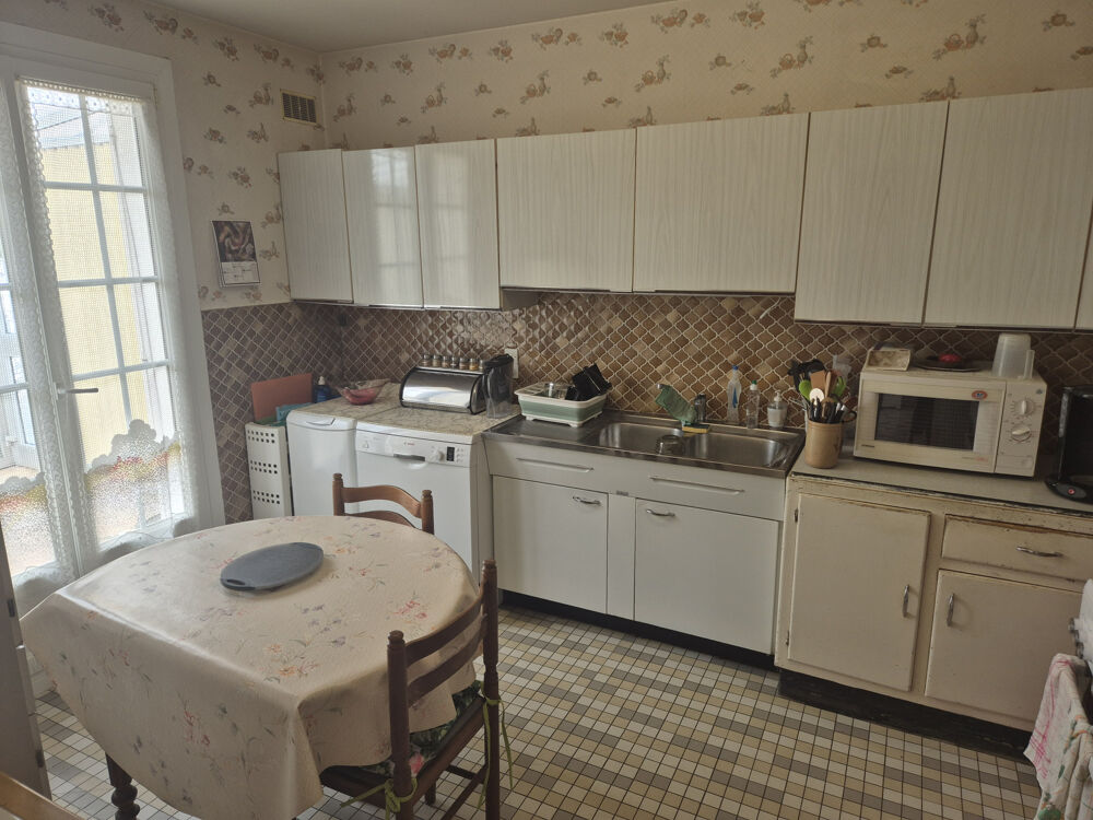 Plain-pied à moderniser de 100m2 avec potentiel 3 chambres