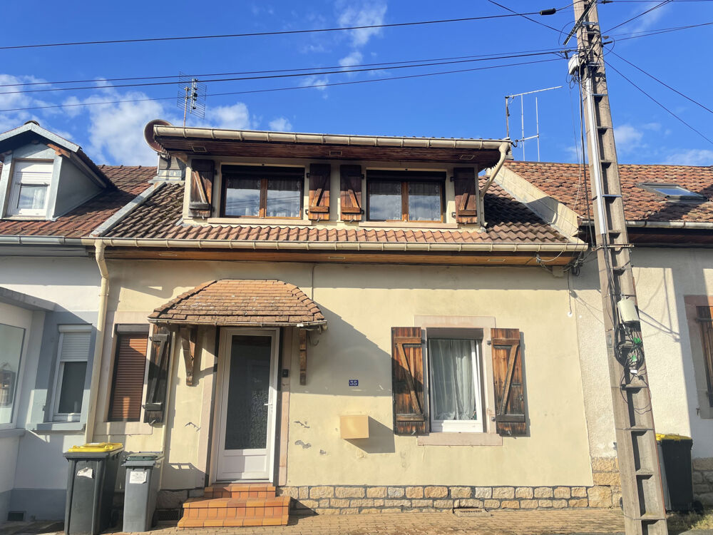 Maison mitoyenne avec terrain