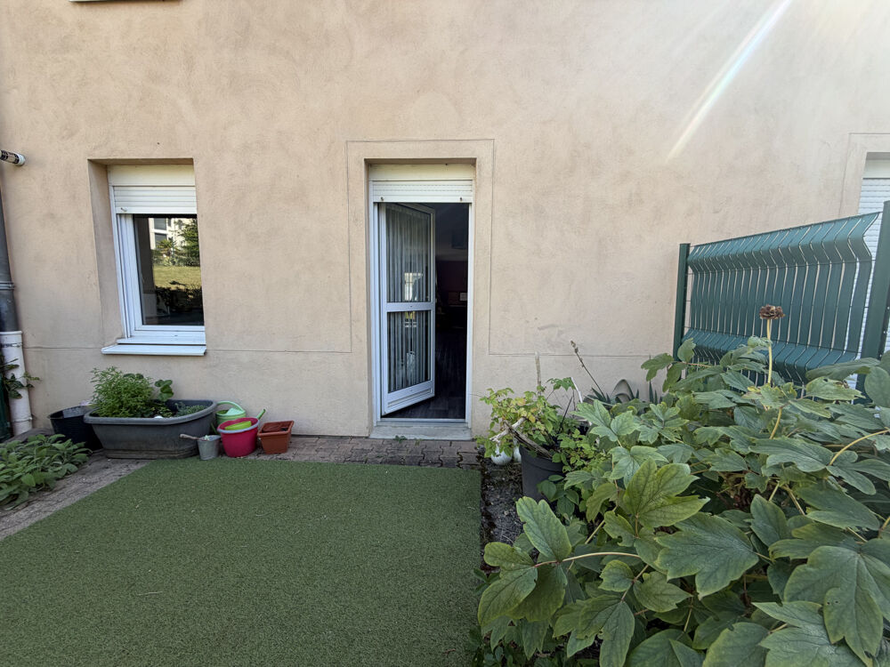 TRIPLEX D'ENVIRON 100 M2 AVEC JARDIN PRIVATIF ET GARAGE