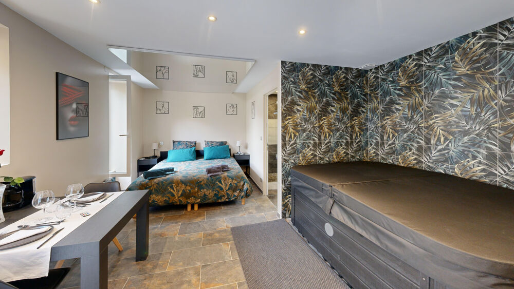 En exclusivité, appartement type loft avec terrasse et place de parking privative au calme sur Eybens village