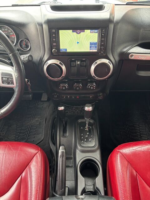 Wrangler 3.6 V6 285 CH RUBICON AWD ETHANOL ET PEDALBOX 2014 occasion 64320 Idron
