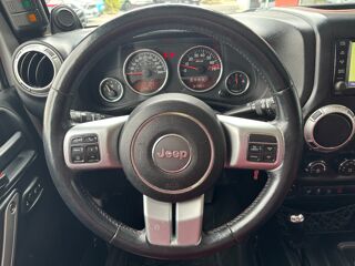 Wrangler 3.6 V6 285 ch RUBICON AWD ETHANOL ET PEDALBOX 2014 occasion 64320 Idron
