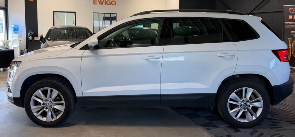 Karoq 1.6 TDI 116 Ch AMBITION - ATTELAGE ELECTRIQUE - 4X2 DSG7 2019 occasion 79000 Niort