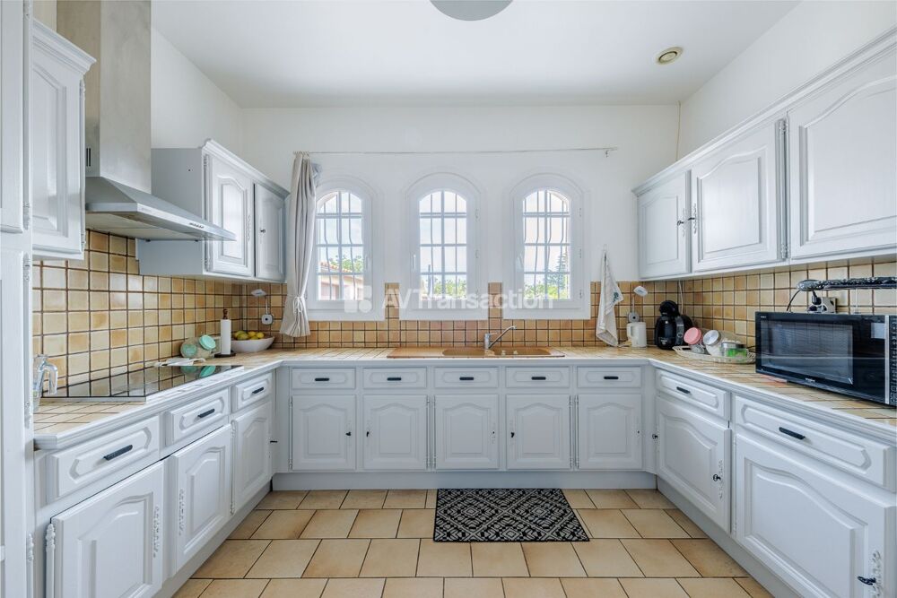 Maison plain pied avec piscine et double garage