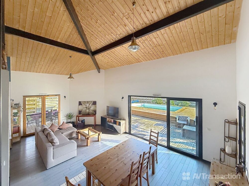 Maison ossature bois au coeur des pins  entre lac et océan