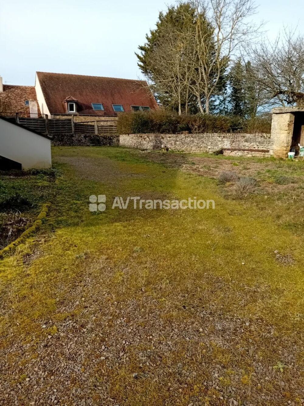 Maison composé de 3 appartements loués, garage et jardin