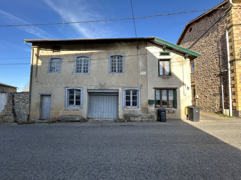 Ensemble immobilier élevé sur 2 niveaux avec terrain attenant, dépendances et garage