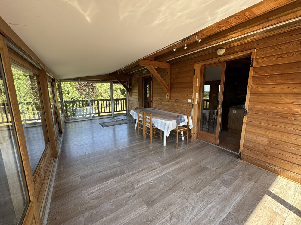 Vente Maison Chalet en bois avec étang et vue campagne   Un véritable havre de paix ! Charlieu