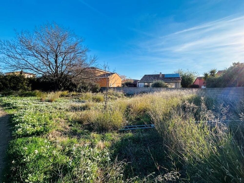 Maison Natura en L de 90 m² proposée ici sur 386 m² de t....