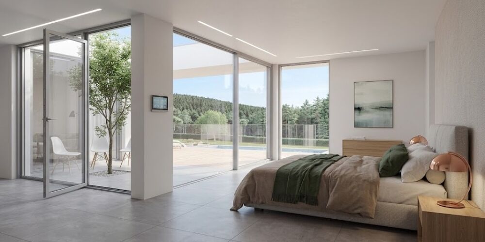 Cette maison contemporaine compose avec le paysage une a....